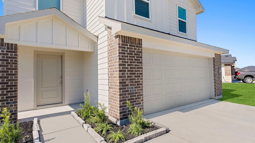 Representative exterior details of a home built from the Davis by D.R. Horton in Watermark, Alvin (Image 3). Representative exterior details of a home built from the Davis by D.R. Horton in Watermark, Alvin (Image 3).