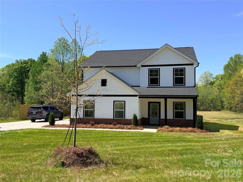 Front exterior of a new home in , Denver, NC, highlighting curb appeal (Image 2). Front exterior of a new home in , Denver, NC, highlighting curb appeal (Image 2).