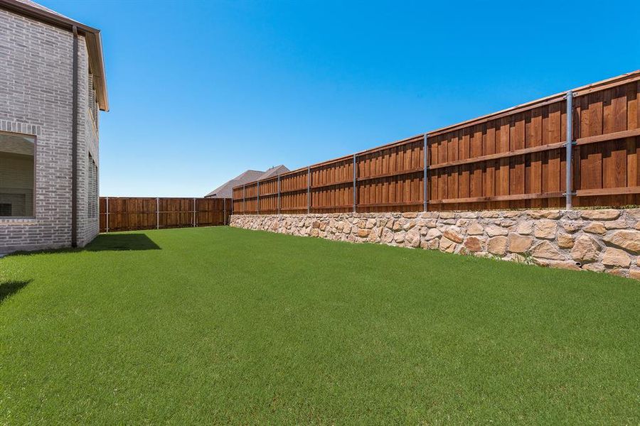 Exterior details and patio area of a home in The Homestead - 62', Rockwall (Image 3).