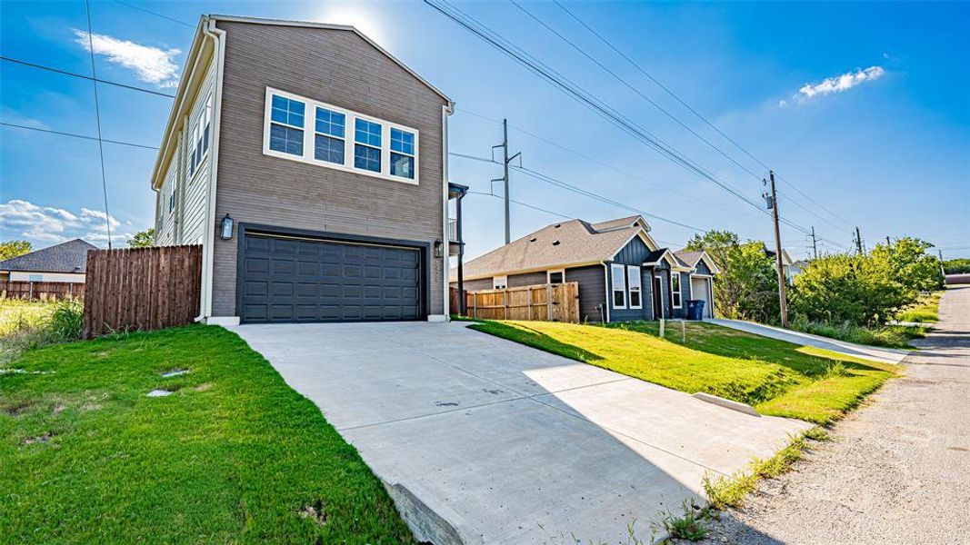Front exterior of a new home in , Granbury, TX, highlighting curb appeal (Image 21). Front exterior of a new home in , Granbury, TX, highlighting curb appeal (Image 21).