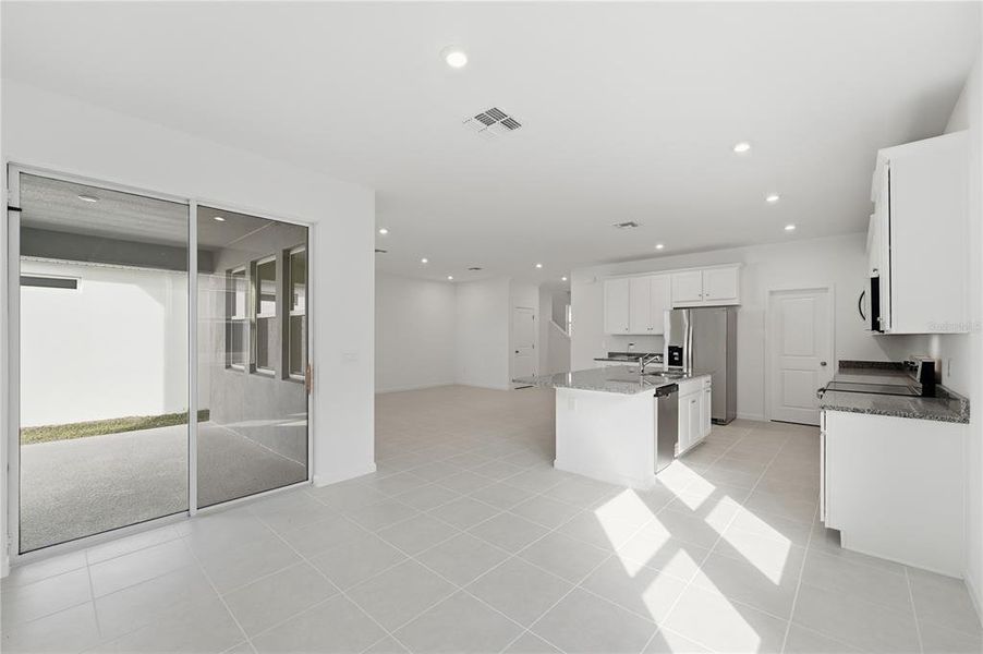 Furnished interior view inside a new home in Rainwood, Clermont (Image 12).