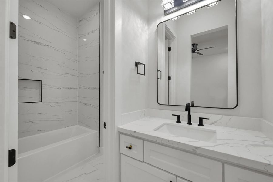 Jack and Joel bedrooms share a well-designed bath with separate sinks for convenience Jack and Joel bedrooms share a well-designed bath with separate sinks for convenience