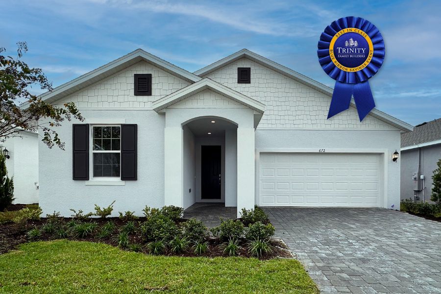 Front exterior of a new home in Trinity Gardens, Deland, FL, highlighting curb appeal (Image 2).