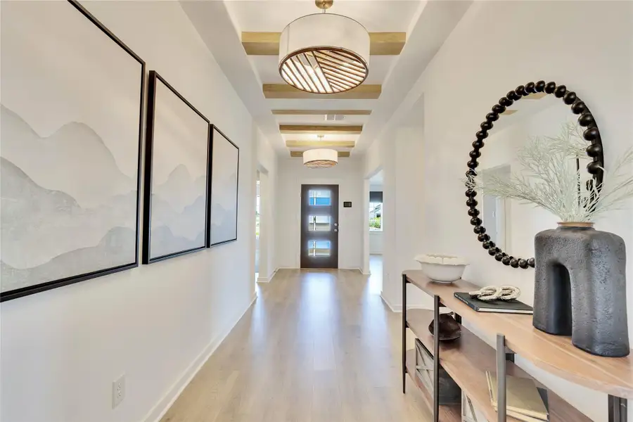 Model home photos of similar floorplans, not pictures of actual home.