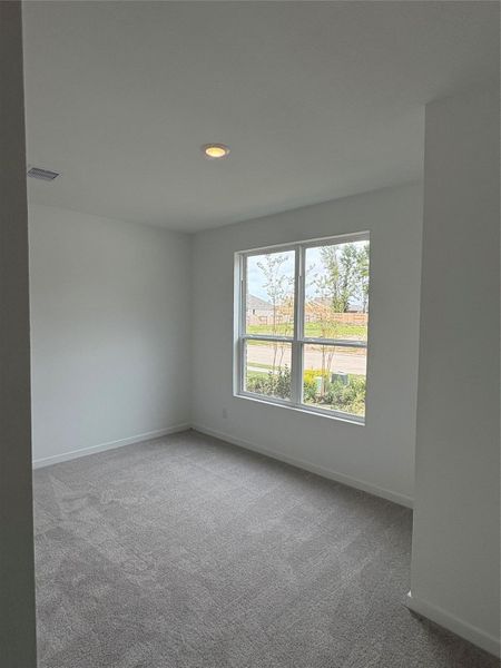 Spacious, unfurnished interior of a new home in ARTAVIA, Conroe (Image 12).