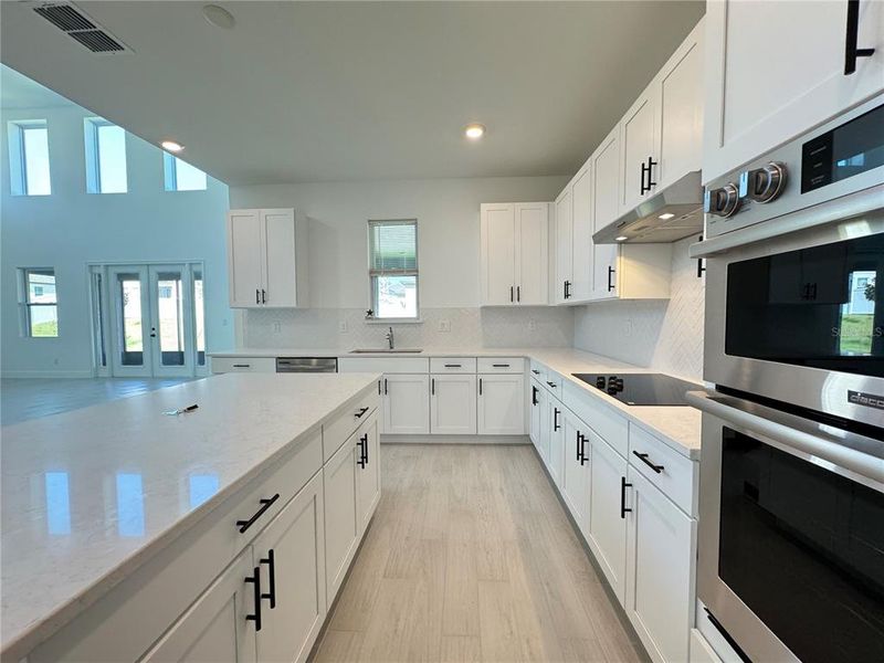 Furnished interior view inside a new home in , Minneola (Image 6). Furnished interior view inside a new home in , Minneola (Image 6).