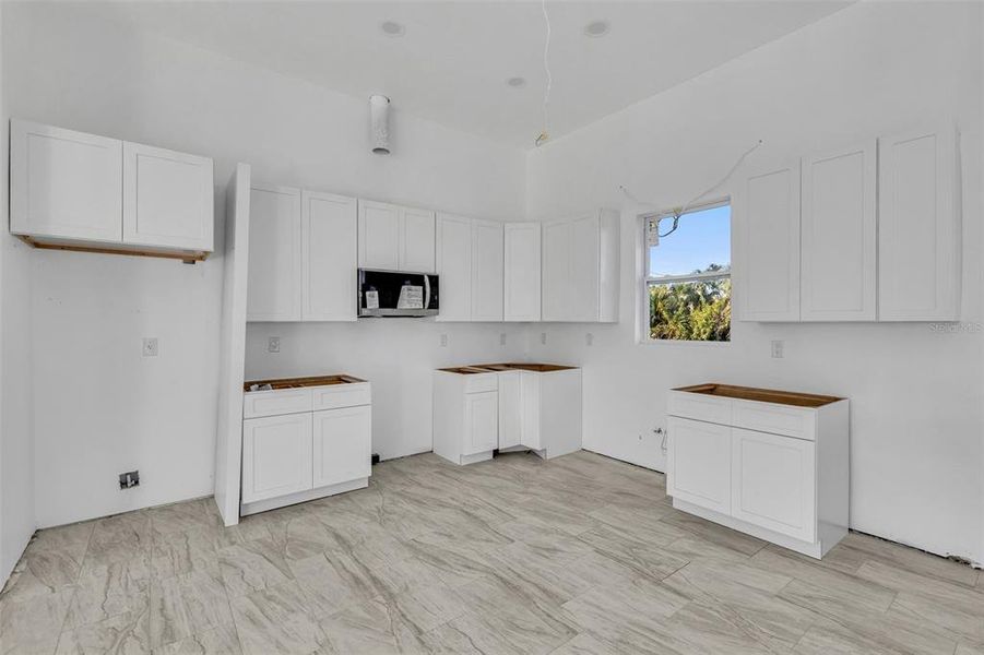 Furnished interior view inside a new home in , Port Charlotte (Image 6).