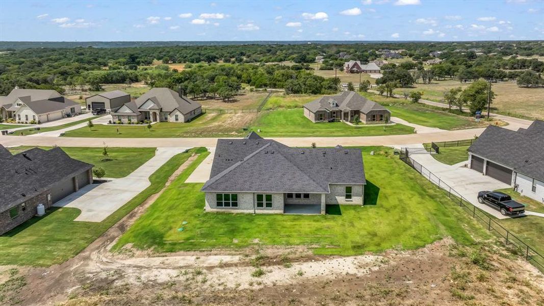 Front exterior of a new home in , Weatherford, TX, highlighting curb appeal (Image 17). Front exterior of a new home in , Weatherford, TX, highlighting curb appeal (Image 17).
