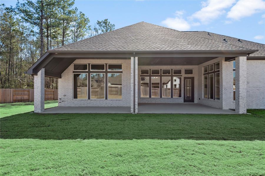 Front exterior of a new home in , Conroe, TX, highlighting curb appeal (Image 23). Front exterior of a new home in , Conroe, TX, highlighting curb appeal (Image 23).