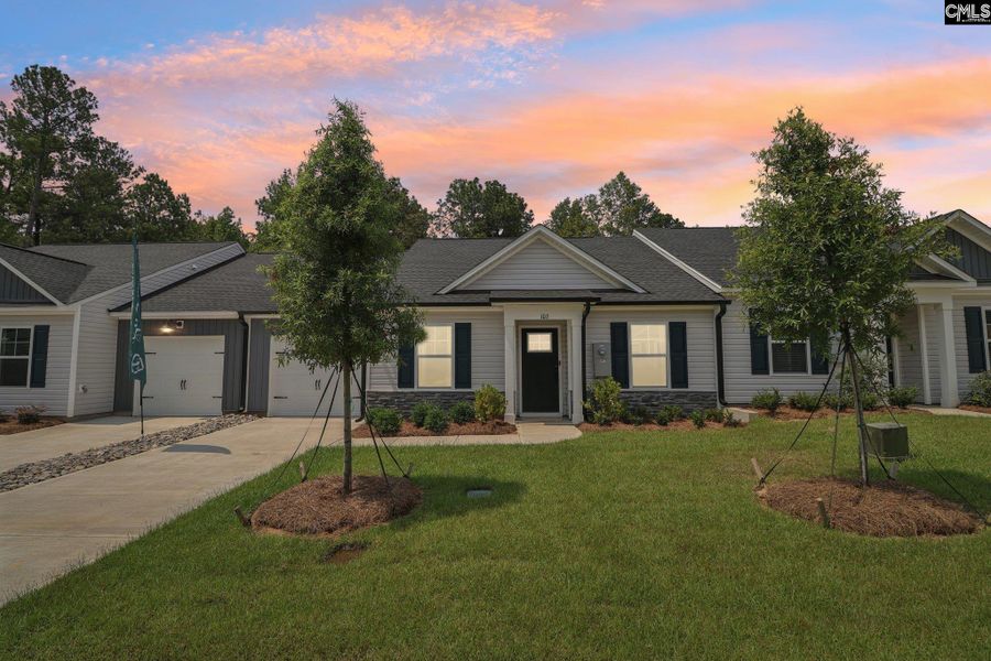 Front exterior of a new home in Piney Woods Bluff, Columbia, SC, highlighting curb appeal (Image 23). Front exterior of a new home in Piney Woods Bluff, Columbia, SC, highlighting curb appeal (Image 23).