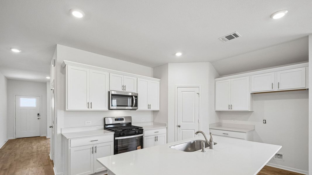 Furnished interior view inside a new home in Prairie Lakes, Buda (Image 7).