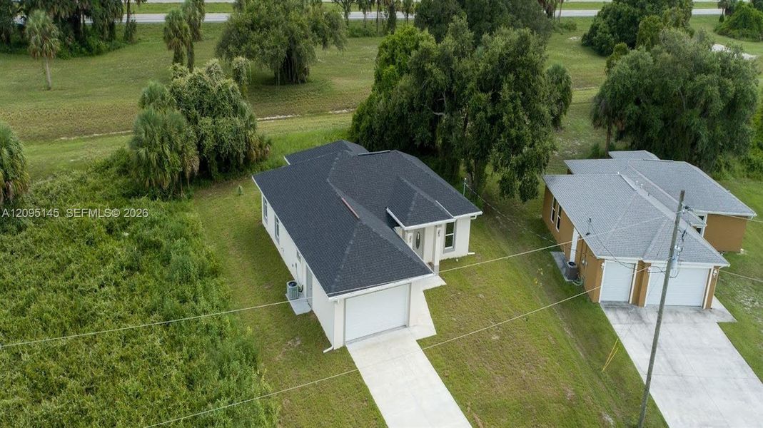 Front exterior of a new home in , Labelle, FL, highlighting curb appeal (Image 23). Front exterior of a new home in , Labelle, FL, highlighting curb appeal (Image 23).