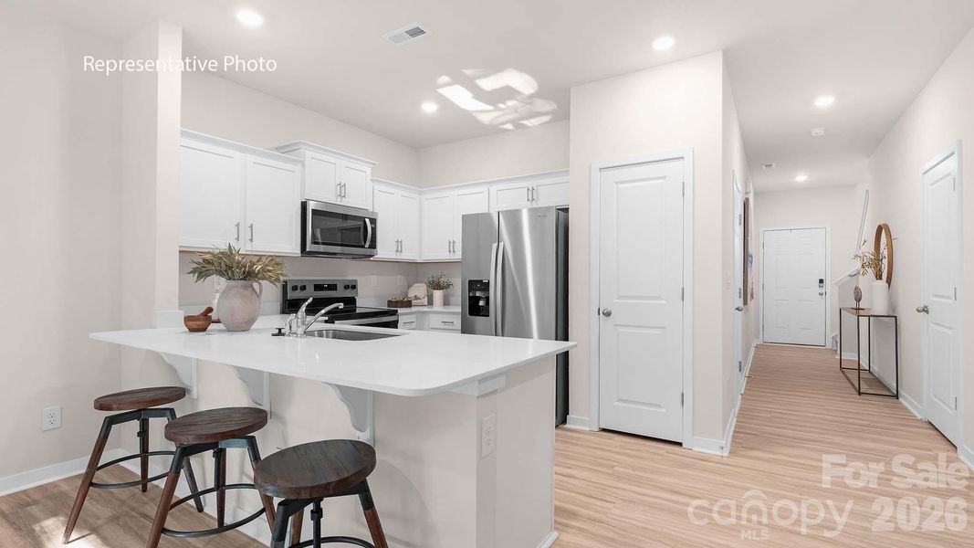 Furnished interior view inside a new home in The Townes at Troutman, Troutman (Image 6).