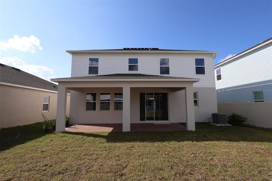 Exterior details and patio area of a home in Eden at Crossprairie, St. Cloud (Image 3).