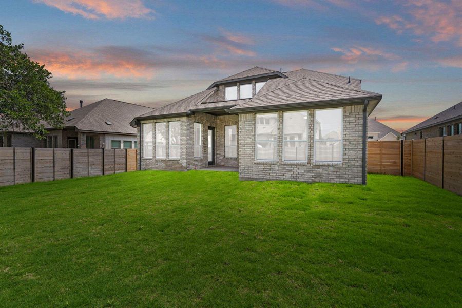Rear of Home and Private Backyard