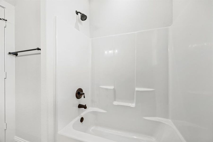 Bathroom with bathtub / shower combination