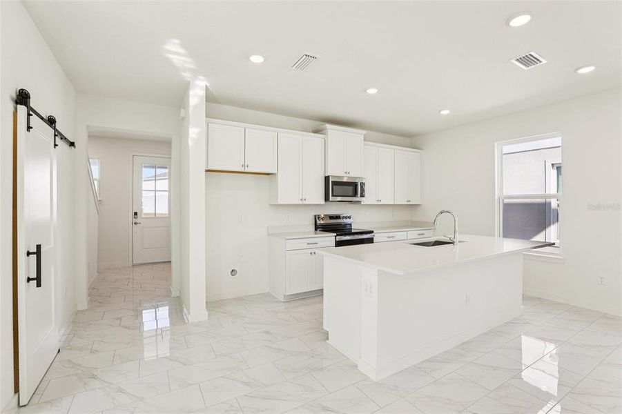 Furnished interior view inside a new home in Trinity Place, St. Cloud (Image 8).