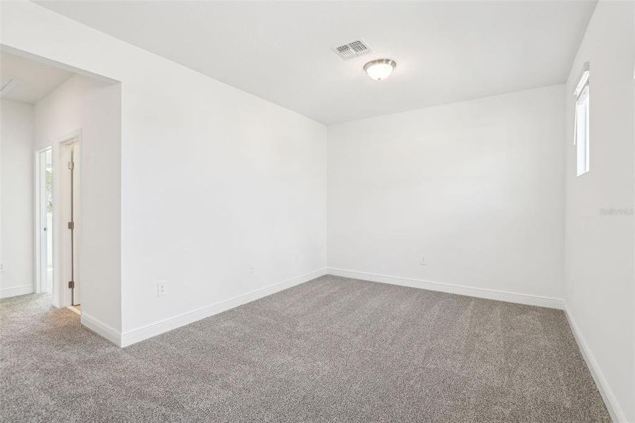 Spacious, unfurnished interior of a new home in Cyrene at Minneola - Villas, Minneola (Image 26).