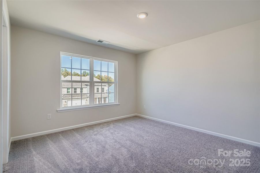 Spacious, unfurnished interior of a new home in Shannon Woods: Walk & Enclave, Maiden (Image 10).