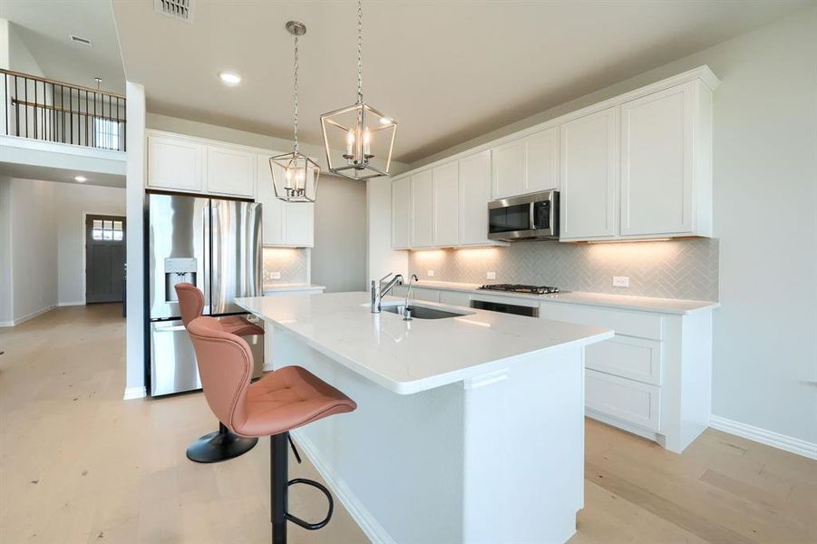 Furnished interior view inside a new home in Lilyana, Celina (Image 18).