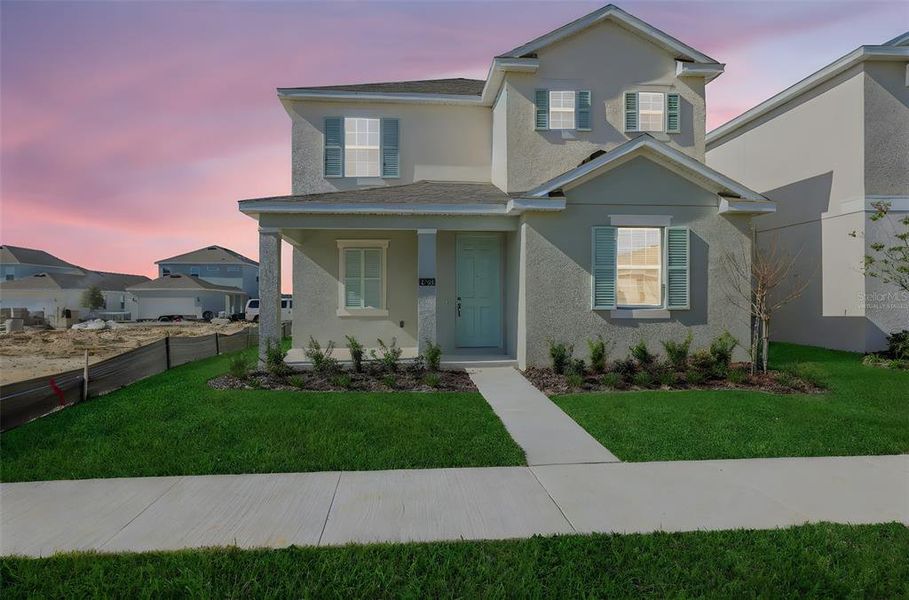Front exterior of a new home in Crossroads at Kelly Park, Apopka, FL, highlighting curb appeal (Image 23).