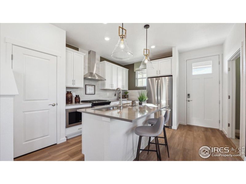 Furnished interior view inside a new home in Villas at Vantage, Berthoud (Image 21).