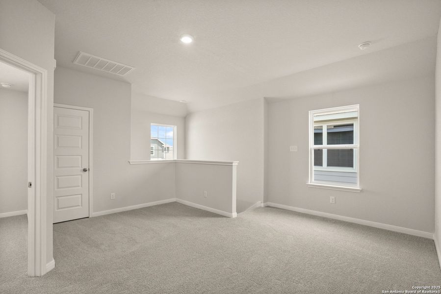 Spacious, unfurnished interior of a new home in Abbott Place, St. Hedwig (Image 22).