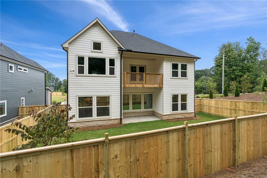 Front exterior of a new home in Settingdown Farms, Cumming, GA, highlighting curb appeal (Image 1).
