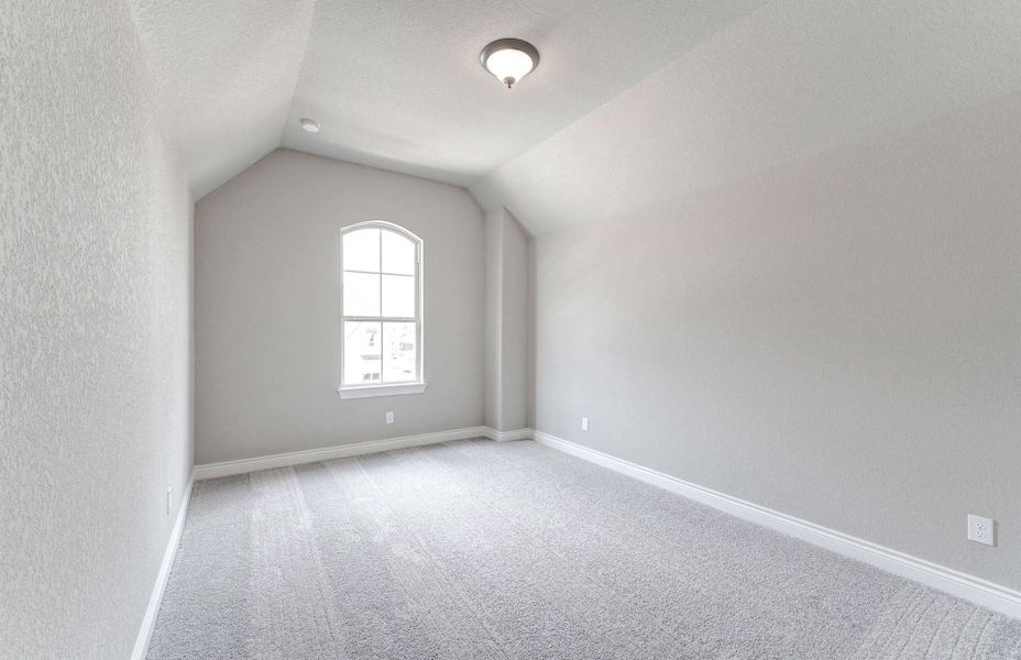 Representative unfurnished interior of a home built from the 3799 by Ravenna Homes in Artavia 70′, Conroe (Image 54).