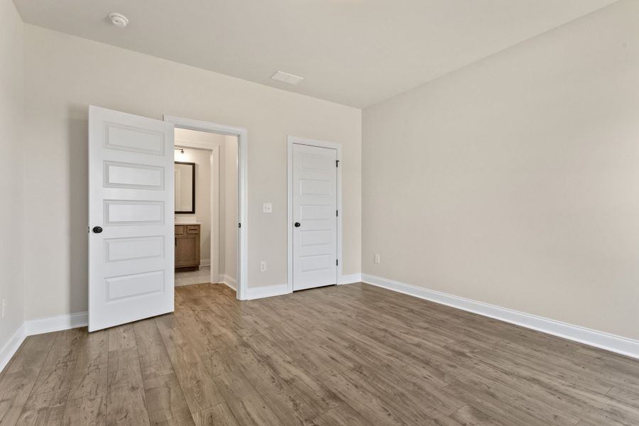 Spacious, unfurnished interior of a new home in Cherokee Knoll, Williamston (Image 19).