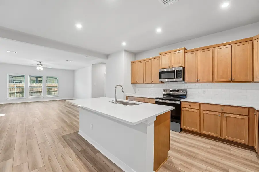 Furnished interior view inside a new home in Hills of Westwood, Temple (Image 5).