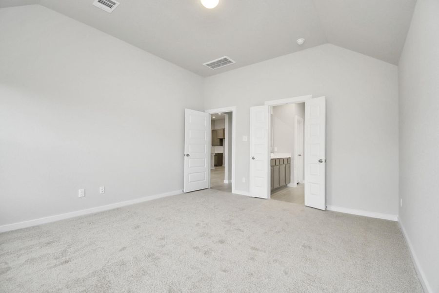Come and unwind after a long day in this magnificent primary suite! This spacious roomfeatures plush carpet, warm paint, high ceilings and large windows with privacy blinds. Sample photo of completed home with similar floor plan. Actual colors and selections may vary. Come and unwind after a long day in this magnificent primary suite! This spacious roomfeatures plush carpet, warm paint, high ceilings and large windows with privacy blinds. Sample photo of completed home with similar floor plan. Actual colors and selections may vary.