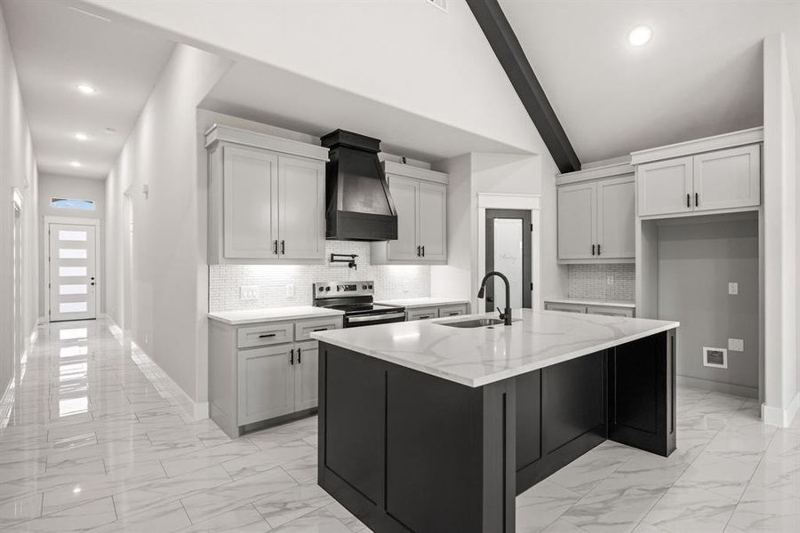 Entrance to property featuring stone siding, a shingled roof, board and batten siding, a garage, and driveway