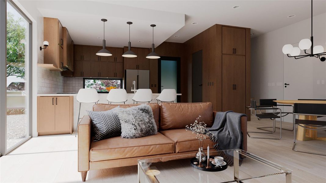 Living room featuring a chandelier and light wood finished floors Living room featuring a chandelier and light wood finished floors