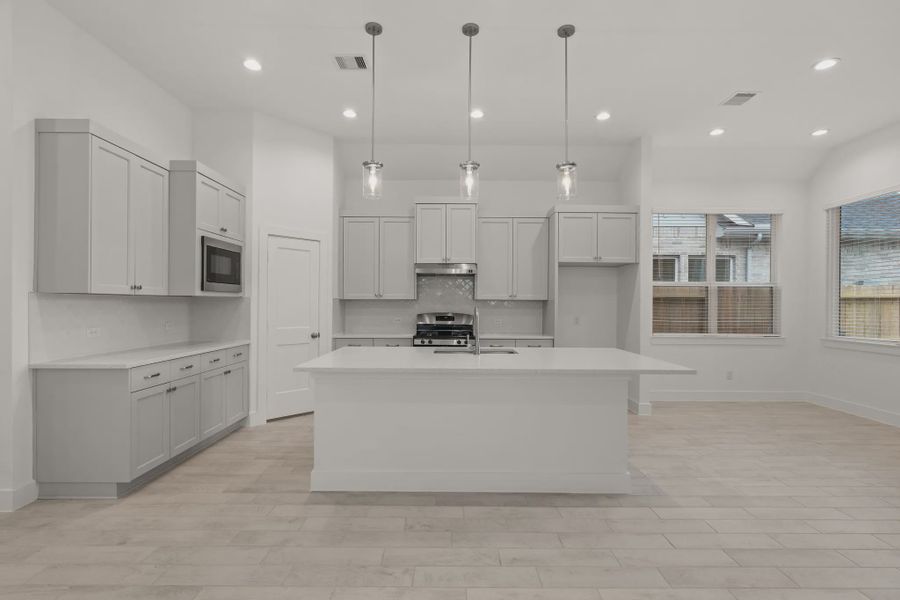 Representative furnished interior of a home built from the Fairway by Chesmar Homes in Riceland Alley Loads, Mont Belvieu (Image 6).