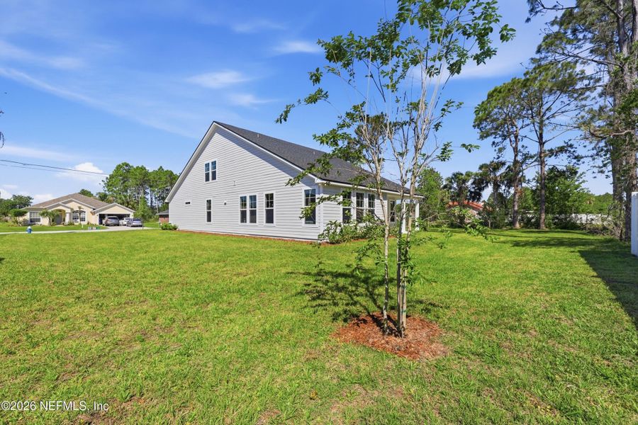 Exterior details and patio area of a home in Palm Coast Homes, Palm Coast (Image 31).