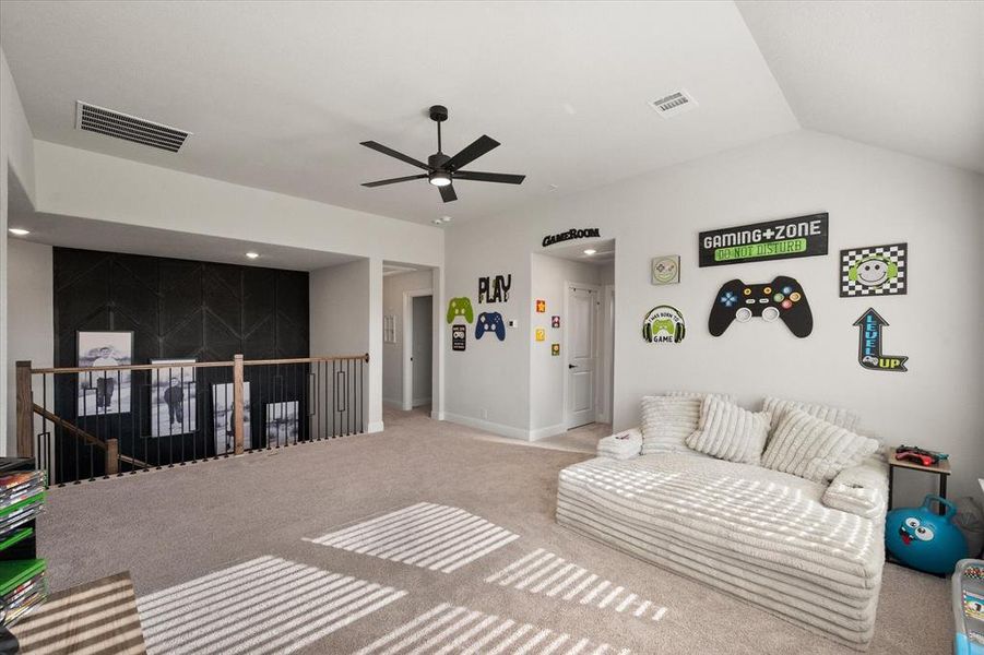 Living room with ceiling fan, carpet, and recessed lighting