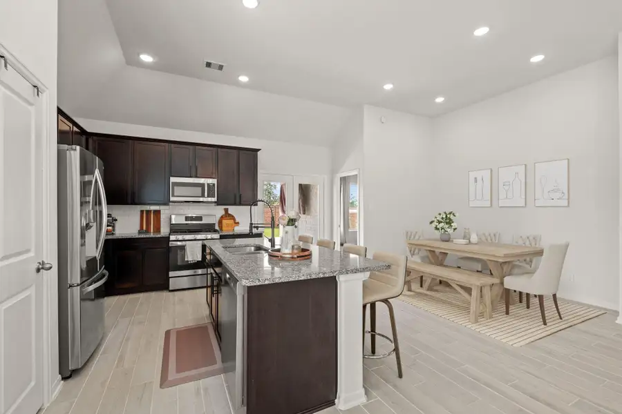 Make memories gathered around the table with your family and friends! The dining area has plenty of space for a large table. *This photo has been partially virtually staged to show the rooms possibilities.