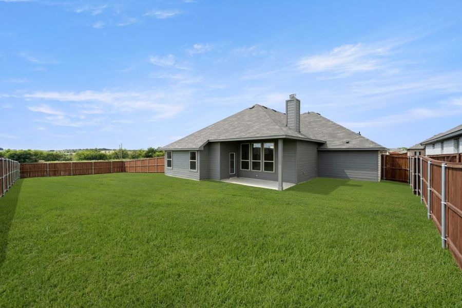 Representative exterior photo of a completed home built from the Walden by Impression Homes in Timberbrook, Justin, TX (Image 23).