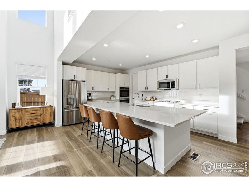 Island seating that works just as well for quick breakfasts as it does for lingering conversations.