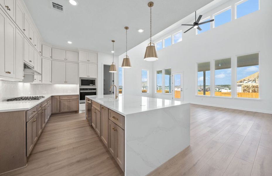 Furnished interior view inside a new home in 6 Creeks, Kyle (Image 6).