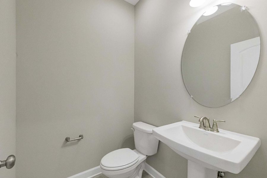 Representative furnished interior of a home built from the Magnolia by Caviness & Cates Communities in Bartlett Manor, Youngsville (Image 189).