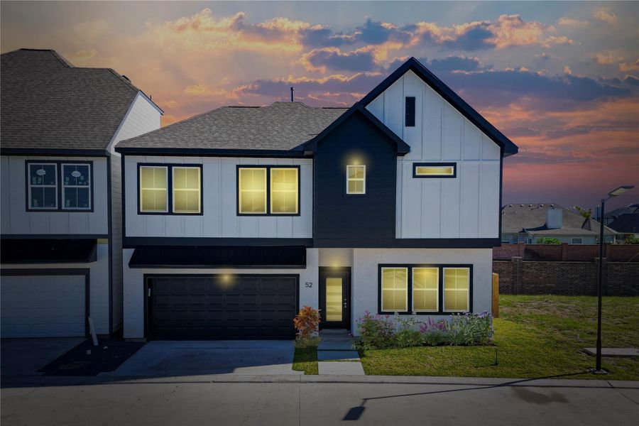 Front exterior of a new home in Metro Village, Houston, TX, highlighting curb appeal (Image 25).