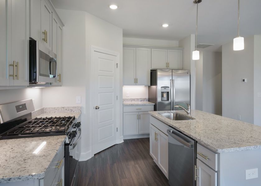 Representative furnished interior of a home built from the The Harper by Cothran Homes in Holly Ridge, Greenville (Image 7).