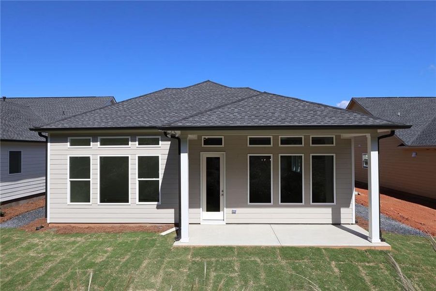 Exterior details and patio area of a home in Maple Grove at Towne Lake, Woodstock (Image 1).
