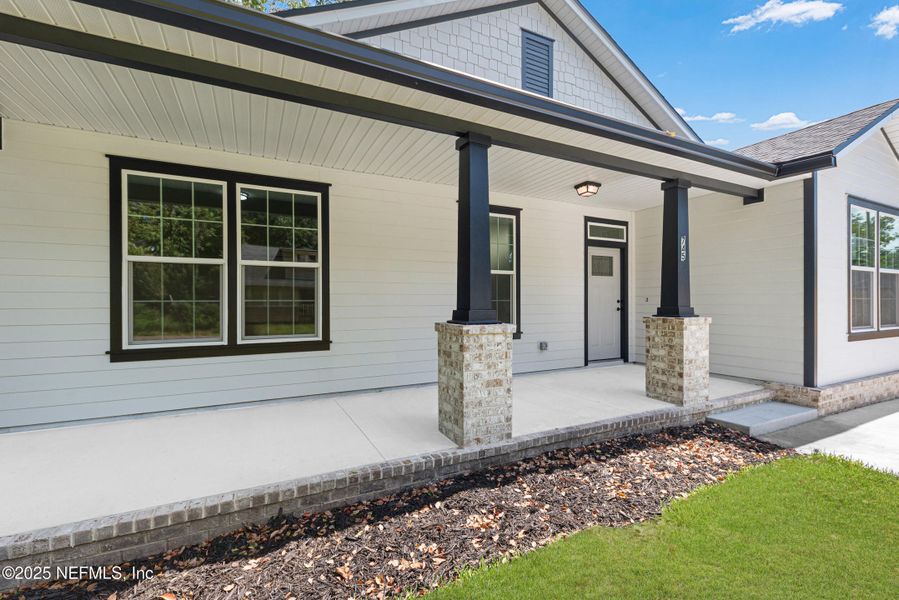 Front exterior of a new home in , Jacksonville, FL, highlighting curb appeal (Image 2).