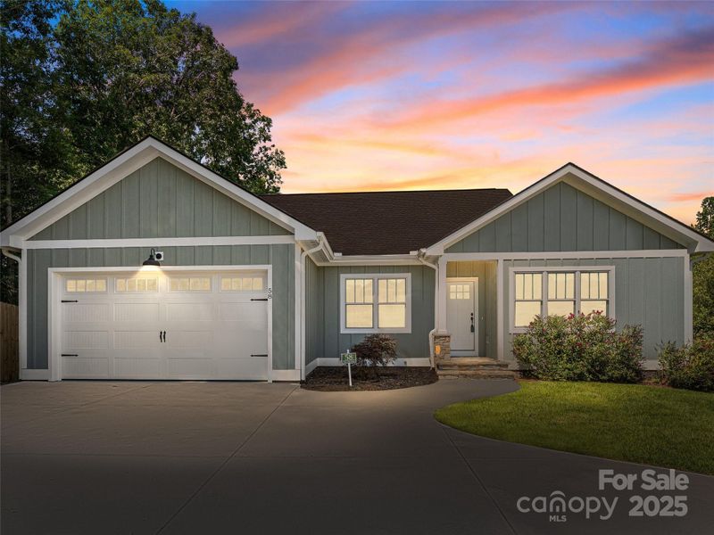 Front exterior of a new home in , Hendersonville, NC, highlighting curb appeal (Image 21).
