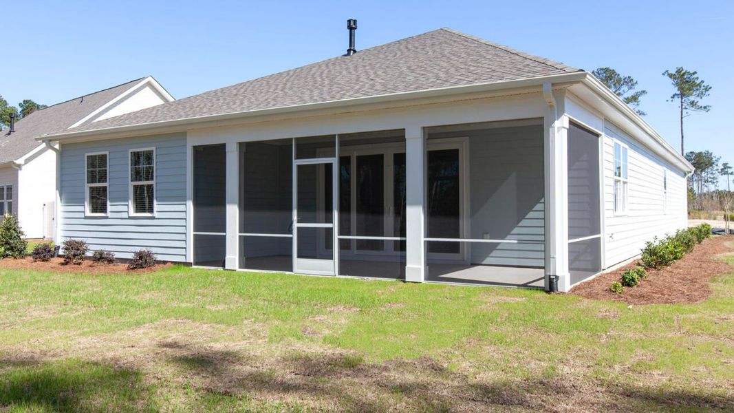 Exterior details and patio area of a home in Indigo Preserve, Leland (Image 3).