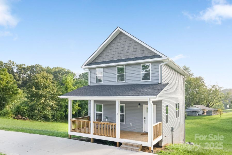 Front exterior of a new home in , Asheville, NC, highlighting curb appeal (Image 24).