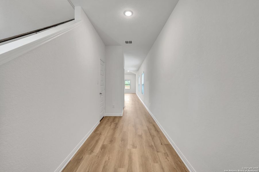 Spacious, unfurnished interior of a new home in Paloma Park, Converse (Image 50).